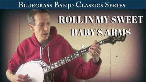  Rollin' in My Sweet Baby's Arms - A Bluegrass Ballad Filled With Yearning and Hopeful Twang